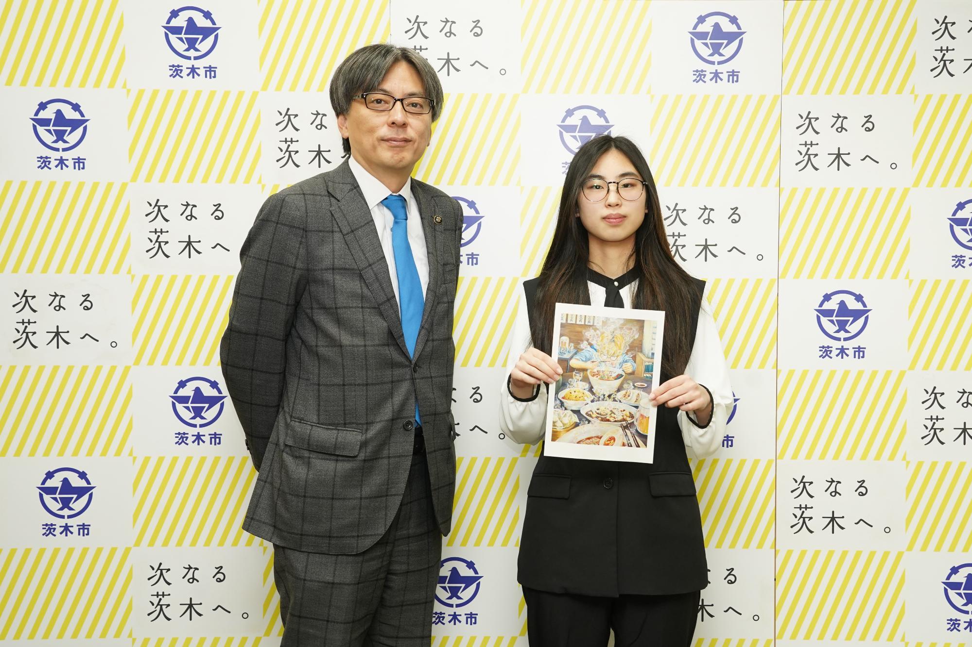 出展者と市長の写真